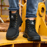 Black 2513 steel toe work boots worn on a yellow industrial platform, front view