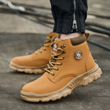 Wheat 2513 lace-up steel toe work boot worn outdoors, side view