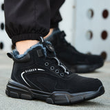 Black 8012 fleece-lined steel toe work boot with dial closure worn outdoors